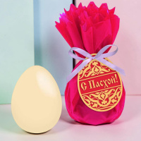 Яйцо из белого шоколада в мешочке