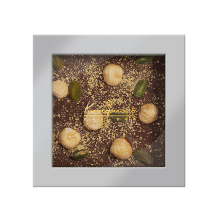 Шоколад молочный с фундуком, фисташкой и апельсиновым кранчем